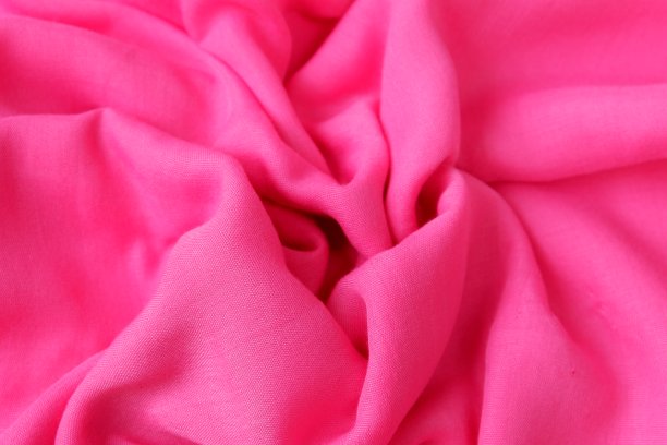 俯视图的粉红色布纹理为背景图片下载