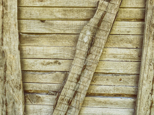 质地,背景。自然,加工过的木材。原木的纹理，树木用木板封起来，入口对陌生人关闭图片下载