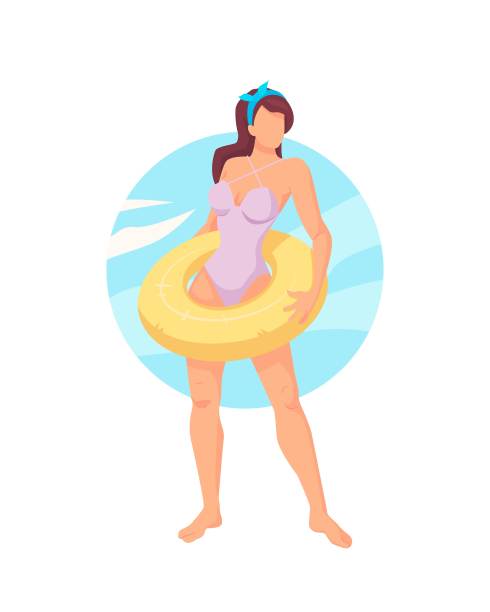 快乐的年轻女子拿着黄色的充气戒指图片下载