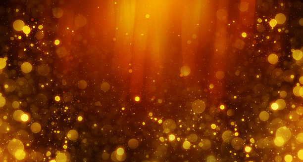 不聚焦的金色背景与粒子在框架的边缘图片下载