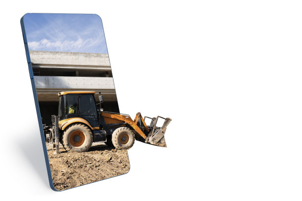 在一栋在建房屋的背景下，一辆带着凸起的铲斗的建筑拖拉机。建筑工地的概念。三维渲染图片下载