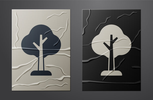 白色的树图标孤立在皱巴巴的纸上图片下载