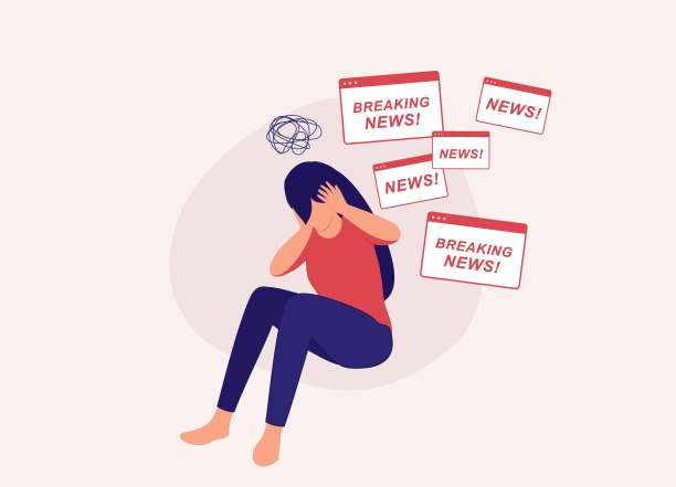 不知所措的女子用手捂住耳朵，以避开所有在线突发新闻。图片下载