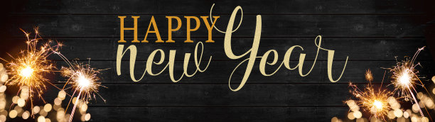 bokeh金色闪光和烟火孤立在质朴的黑色木制纹理-节日新年前夕西尔维斯特新年派对节日背景横幅贺卡图片下载