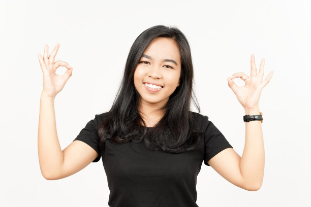 在白色背景上显示美丽的亚洲女人被孤立的迹象图片下载