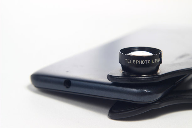 照片附加智能手机镜头长焦2X摄影在白色背景图片下载
