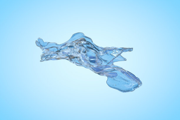 蓝色背景上的液态水喷溅图片下载