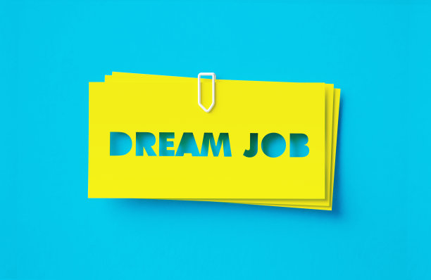 在绿松石色的背景上剪下黄色的不干胶图片下载