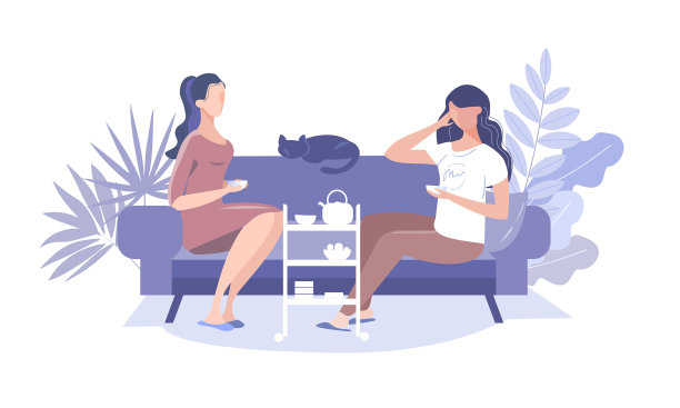 两个朋友在沙发上喝着一杯咖啡聊天图片下载