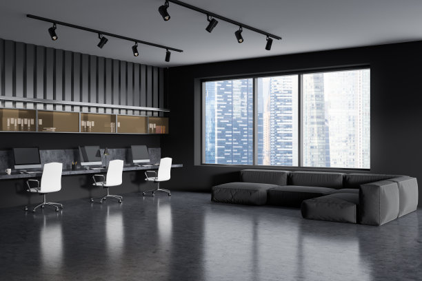 办公室内部有沙发和桌子，配有电脑，窗户可以看到城市景色图片下载