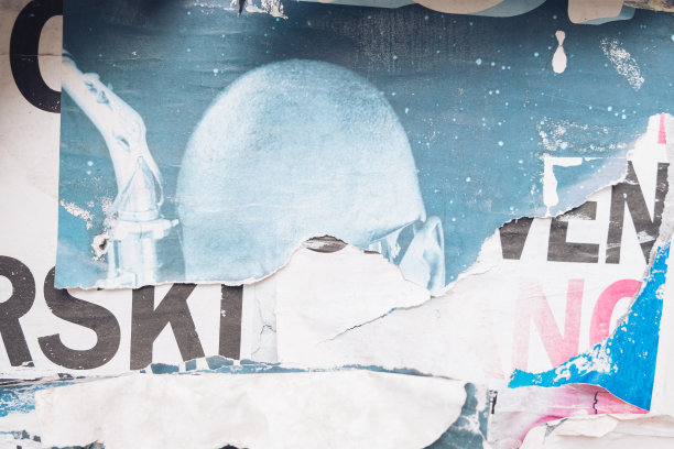 撕裂的街道海报背景与撕裂的人体部分图片下载