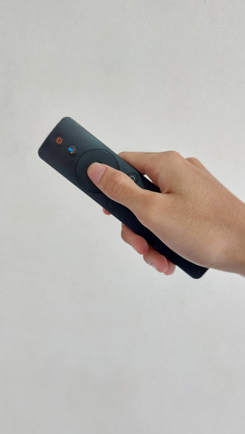 手持电视遥控器俯视图图片下载