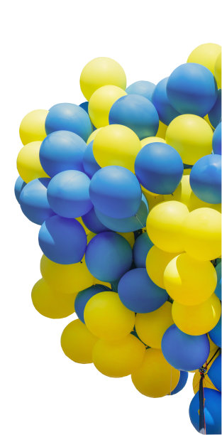 黄色和蓝色的气球。一大堆球。气球背景与地方的文本。图片下载