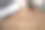 简单的工作场所，木制桌子上有笔记本电脑、咖啡杯、计算器和笔记本。平视，俯视图，复制空间。图片下载