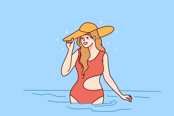 微笑的女人在海里泳装图片下载