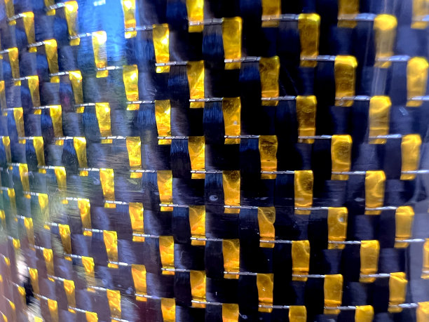 一个美丽的闪闪发光的金蓝色编织和漆玻璃。图片下载