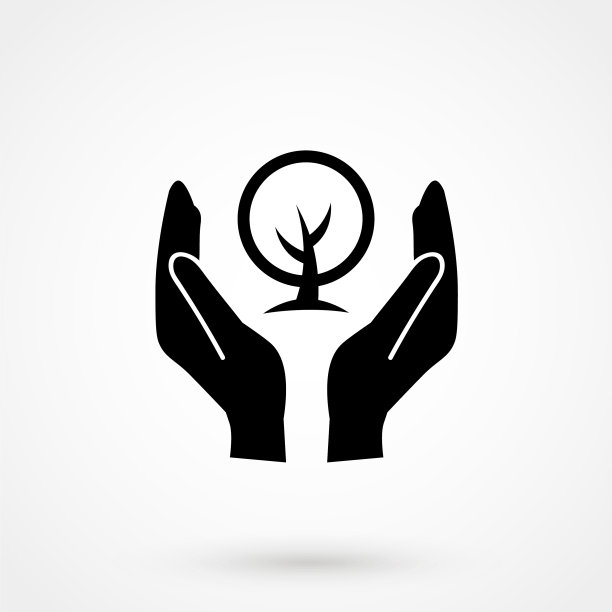 在一个环保的手势中萌芽图片下载