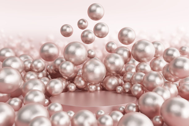 讲台上展示着珍珠闪亮的圆形球体圆形粉金色。图片下载