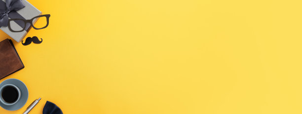 父亲节礼物的想法设计概念与礼品盒上的黄色背景。图片下载