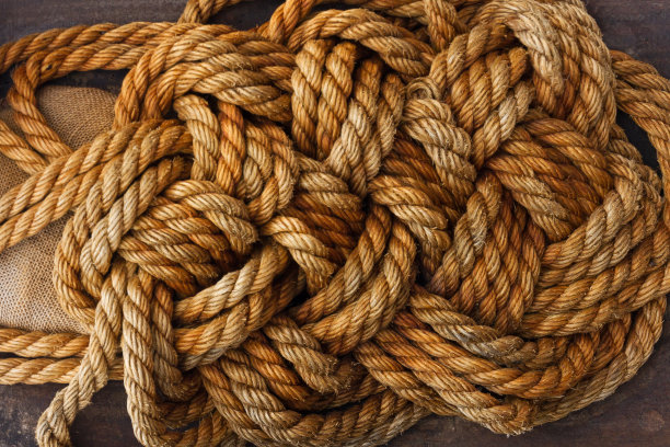 绳索黄麻钓具上的棕色木质背景纹理图片下载