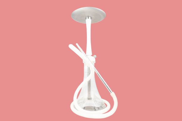 水烟，水烟用软管隔离在粉红色的背景图片下载