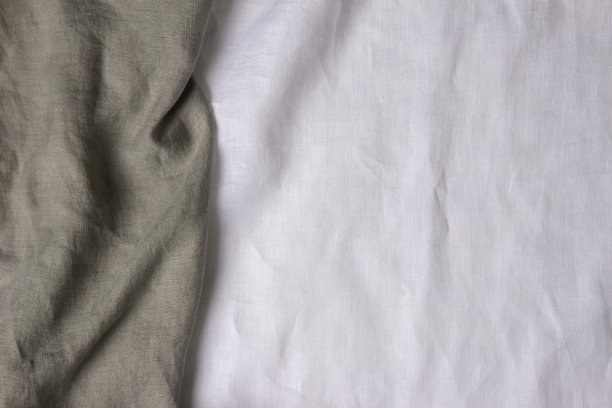 抽象亚麻织物纹理背景。褶皱天然亚麻有机生态纺织品帆布背景。俯视图图片下载