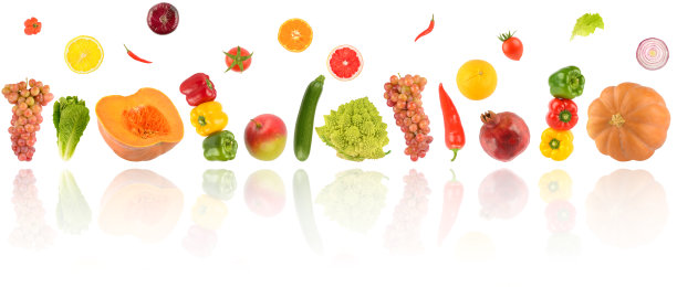 落下的新鲜蔬菜和水果上有白色的反光隔离图片下载