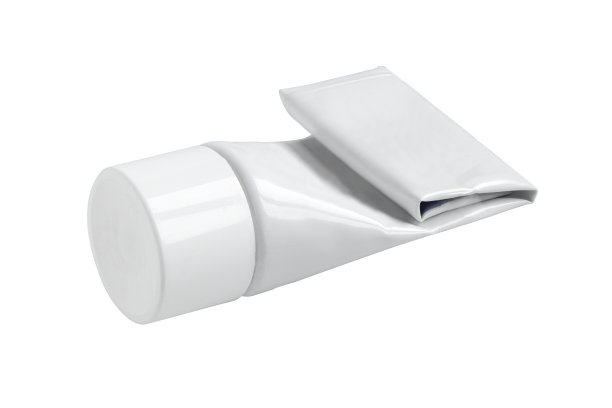 白色背景上孤立的空白灰色管包装。使用空的和空白的奶油容器图片下载