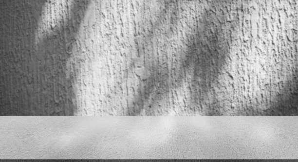 背景空灰色水泥墙面，房间背景有阴影。图片下载