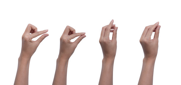 一套亚洲女人的手抓，挑选和持有无形的项目。孤立在白色图片下载