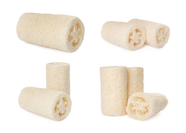 在白色背景上放置天然丝瓜沐浴海绵图片下载