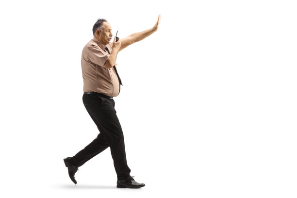 手持对讲机奔跑的保安图片下载