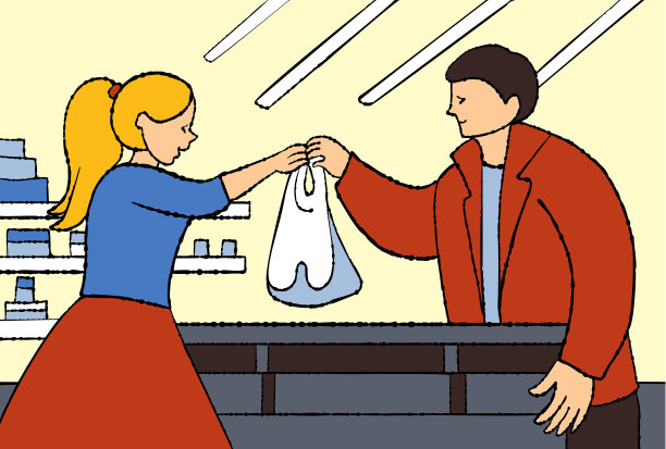 一位女售货员把一个购物袋递给一位男士。图片下载