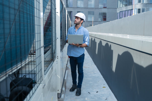 工业冷水风机盘管空调器是大型工业建筑水冷却塔空冷器暖通空调系统中控制空气系统的一种图片下载