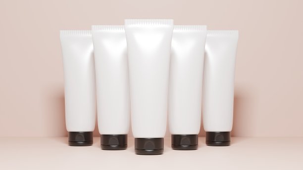 白色美容管的护手霜化妆品。美容管模型与阴影在粉红色的背景。化妆品和药瓶极简设计包装模型。三维渲染图片下载
