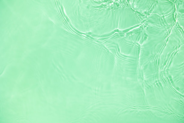 透明的绿色，清澈平静的水面纹理图片下载
