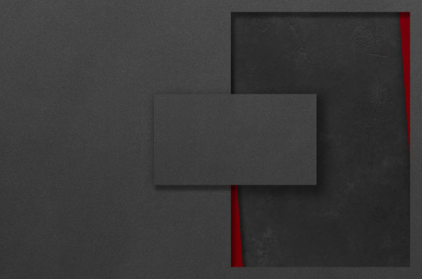 黑色和红色的矩形模型在黑暗的混凝土背景上。设计元素或作品集。副本的空间。图片下载