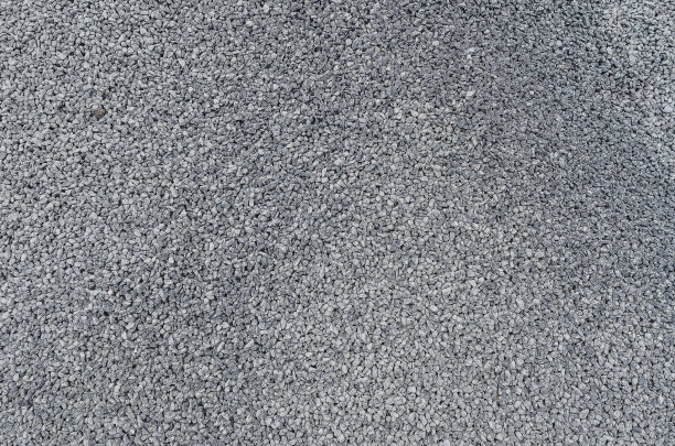 抽象的石头纹理。灰色的砾石。小的灰色石头。建筑材料。全景照片。图片下载