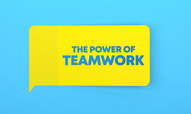 蓝色背景上写着黄色的不干胶:团队合作的力量图片下载