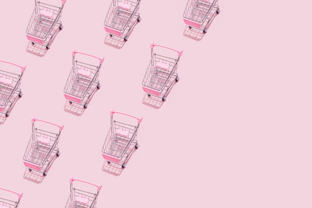超市购物车的图案在粉彩粉红色的背景。包装创意设计。在线购物。无缝模式。黑色星期五促销概念。副本的空间。可持续的,极简主义的生活方式。图片下载