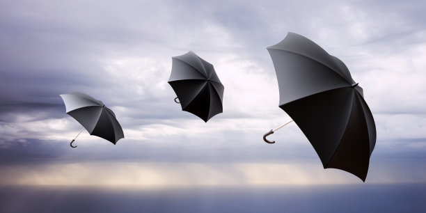 伞随风高飞，天空多云。自由，天气，冬季的概念。三维渲染图片下载