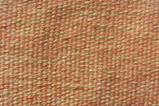 织物纹理的特写在棕色橙色的颜色。图片下载