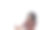 美丽的黑人女性坐在那里用手机，看起来既惊讶又兴奋图片下载