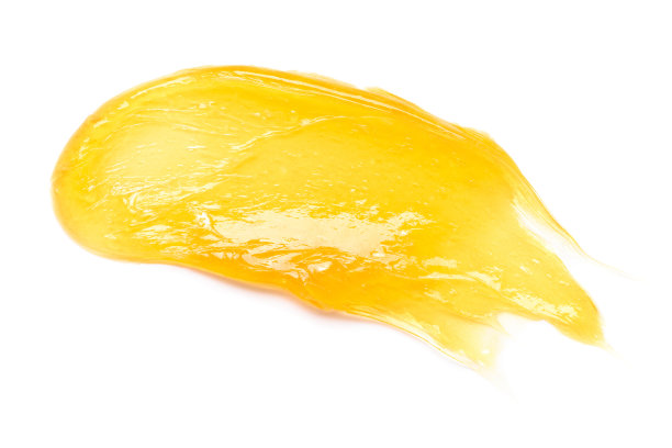 黄色凝胶糖蜂蜜涂抹污宏观孤立在白色背景图片下载