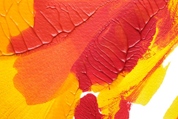 利用罗夏墨迹法在白纸底色上绘制红黄抽象丙烯画的色彩肌理图片下载