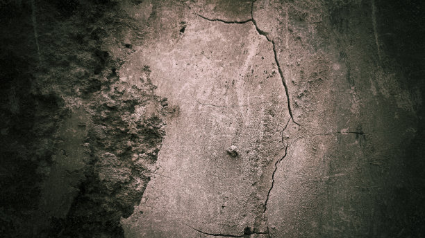 可怕的黑色水泥纹理作为背景，旧的混凝土墙充满了划痕图片下载