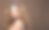 年轻的金发女子，长而健康，有光泽的卷发。波浪发型的美丽模特女性。图片下载