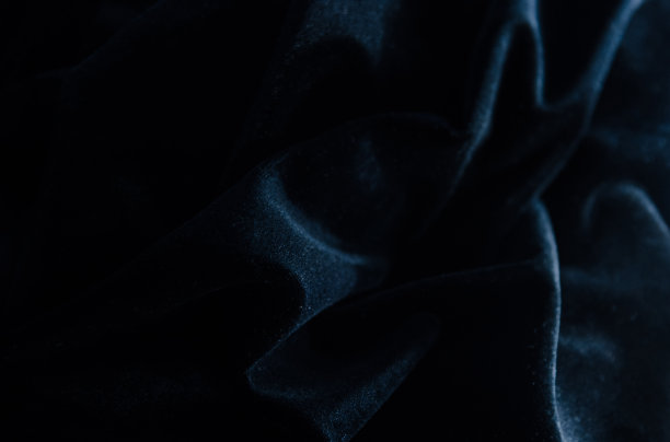 背景与天鹅绒黑色织物图片下载