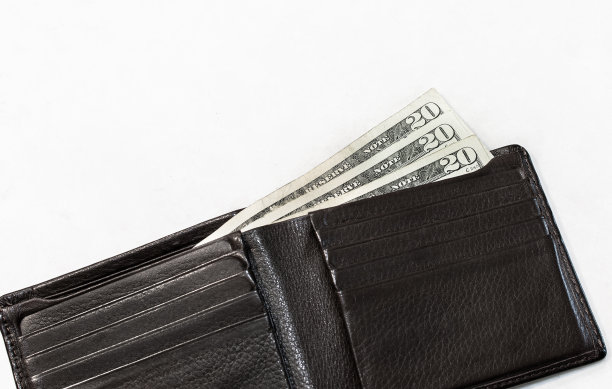 钱包里有20美元的钞票。图片下载