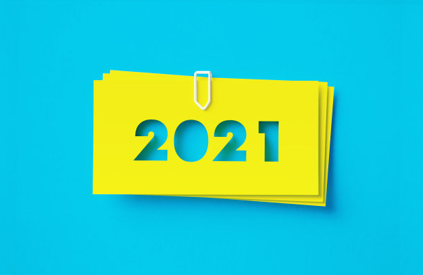 在蓝色背景上剪下黄色的不干胶图片下载